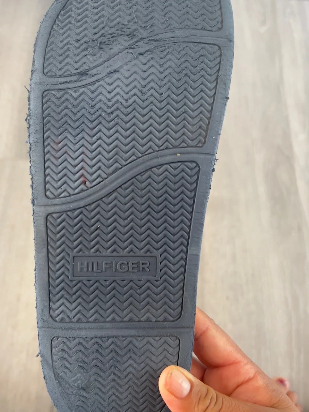 Tommy Hilfiger Navy Slides with Red It doesn't have a number but it's like a 10